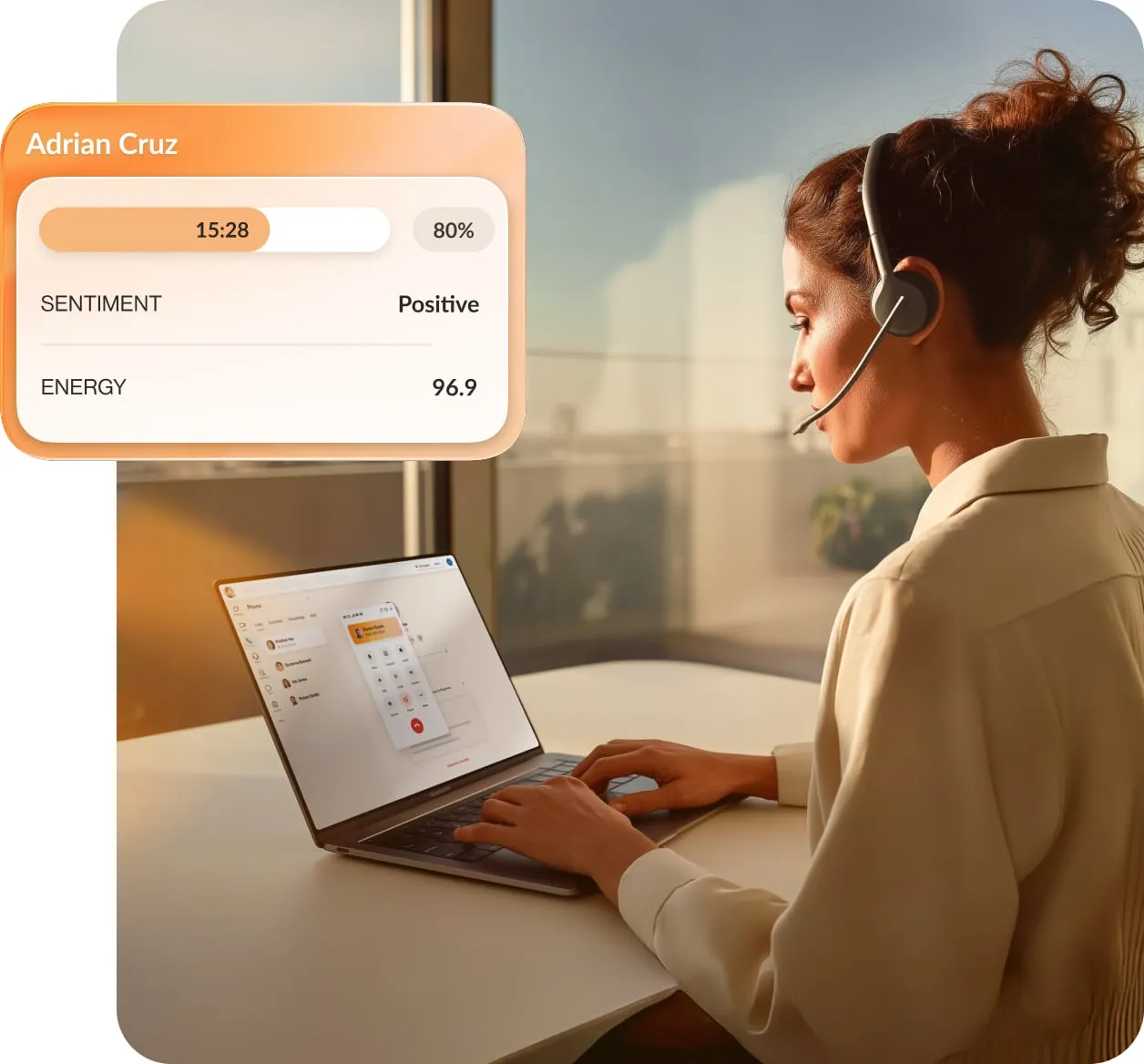 A woman looking at a laptop while on a voice call via the RingCentral app with an inlay image of the RingCX sentiment and energy tracker