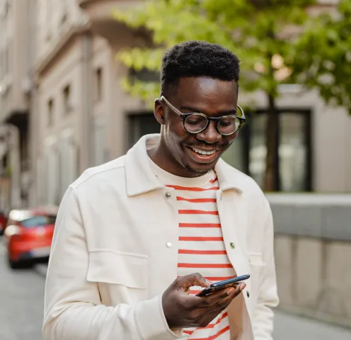A man reading the RingEX Service Privacy datasheet on his mobile phone