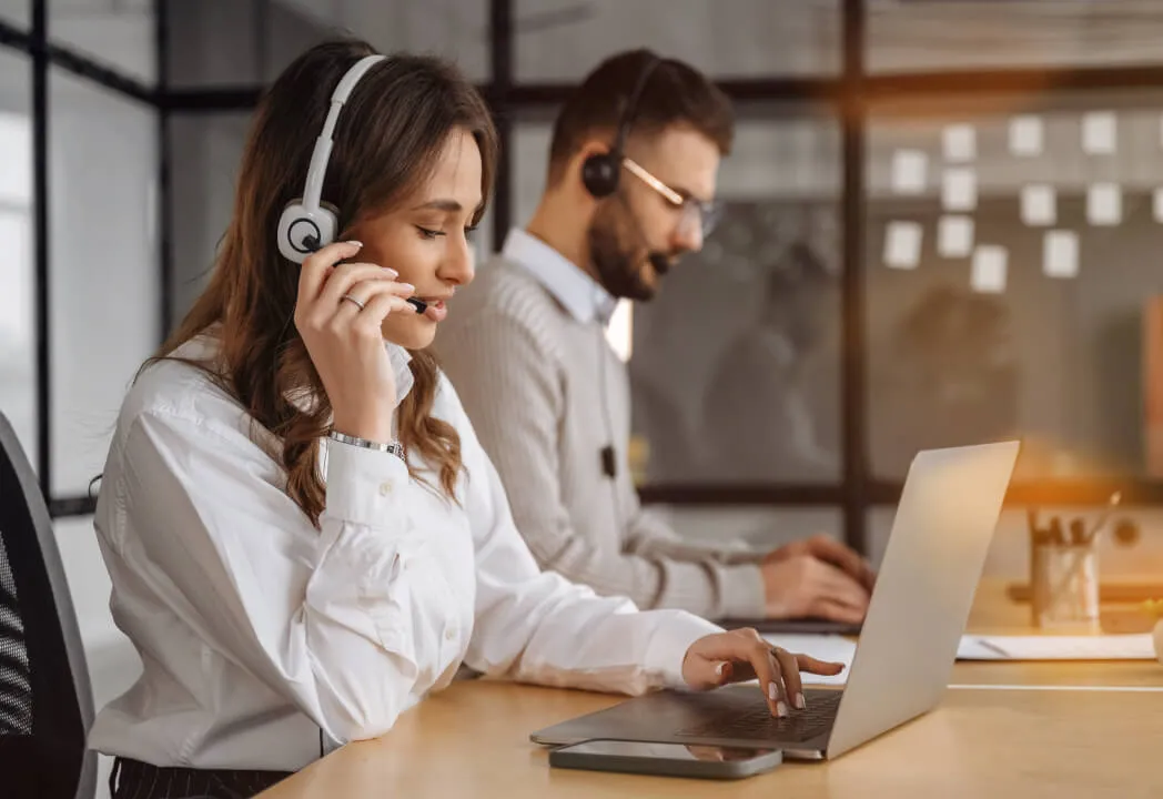 RingCentral support team members engaged in calls with customers