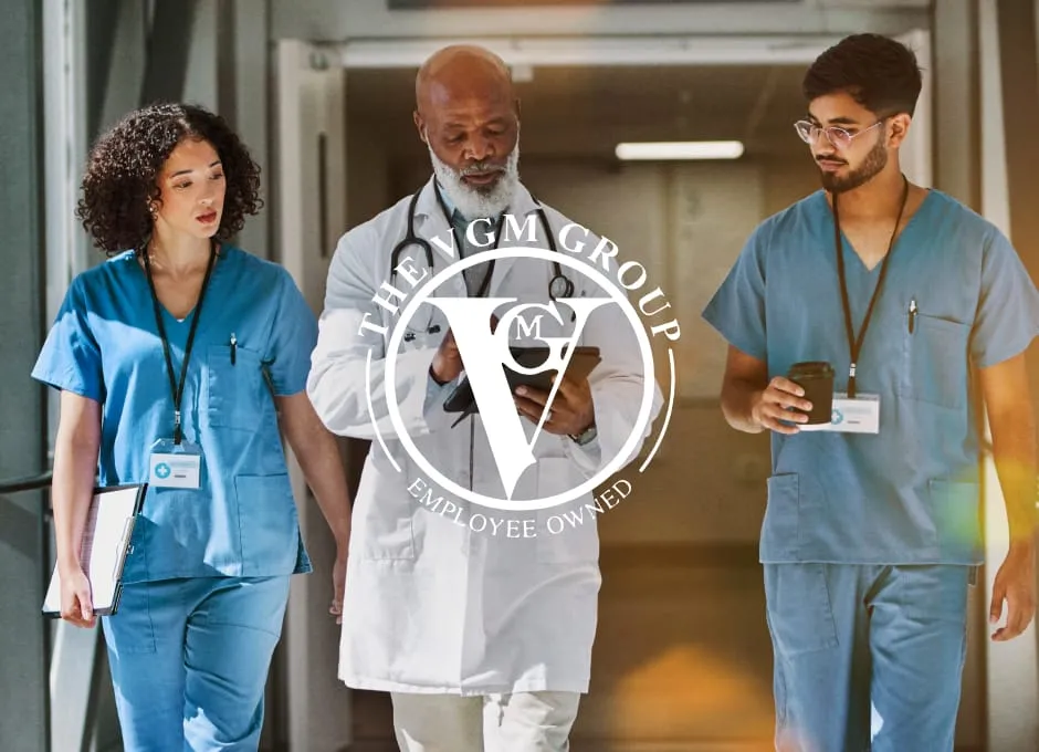 Medical professionals walking down a hall